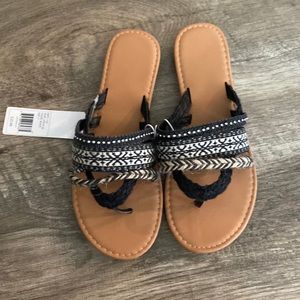 Women’s size 7 sandals. Brand New. Black/tan and rhinestones.